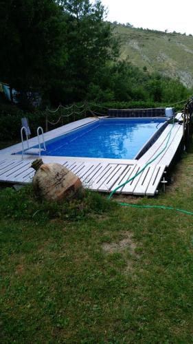 a large swimming pool in a field with at Prà de Mandè in Viano