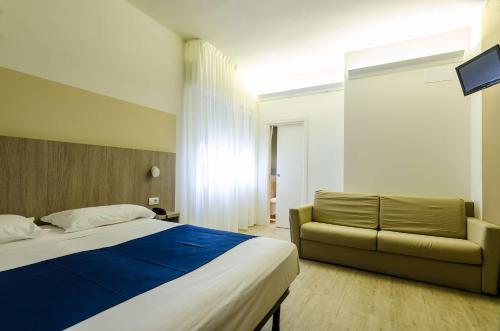 Postel nebo postele na pokoji v ubytování Hotel Mare Live