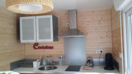Kjøkken eller kjøkkenkrok på Chalet-studio Bien-Hetre