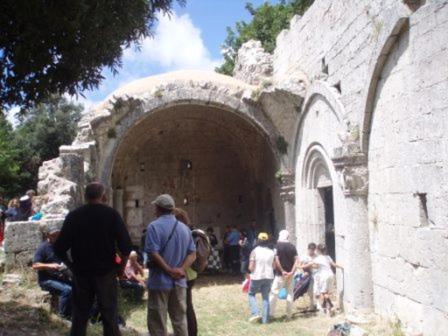 a group of people standing outside of a building at Agriturismo Monte Sacro in Mattinata