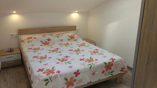 Ένα ή περισσότερα κρεβάτια σε δωμάτιο στο Apartments Angeline