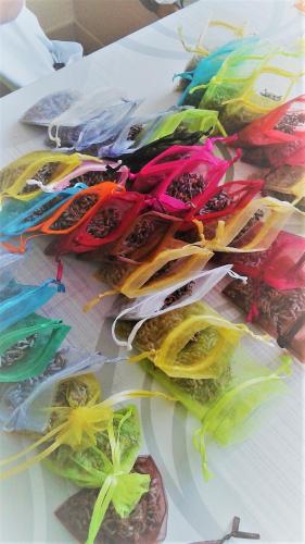 a pile of colorful plastic bags on a table at Le Prieuré in Saint-Dalmas-de-Tende