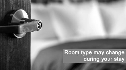 a lock on a door with the words room type may change during your stay at Casa Del Golfo in Lacona