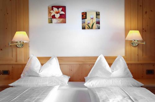 Postel nebo postele na pokoji v ubytování Mountain B&B - La Scalira