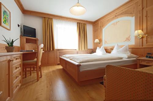 Postel nebo postele na pokoji v ubytování Mountain B&B - La Scalira