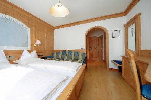 Postel nebo postele na pokoji v ubytování Mountain B&B - La Scalira