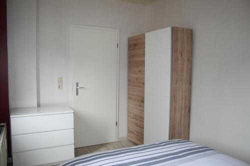 Llit o llits en una habitació de La clé des vacances