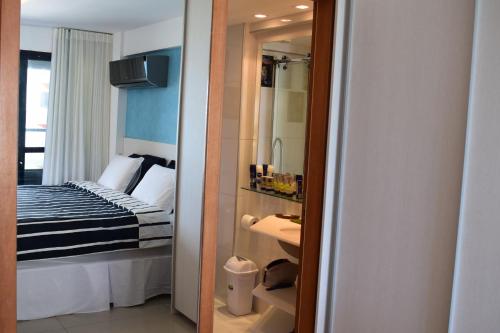 Ett badrum på Cobertura Duplex Luxo