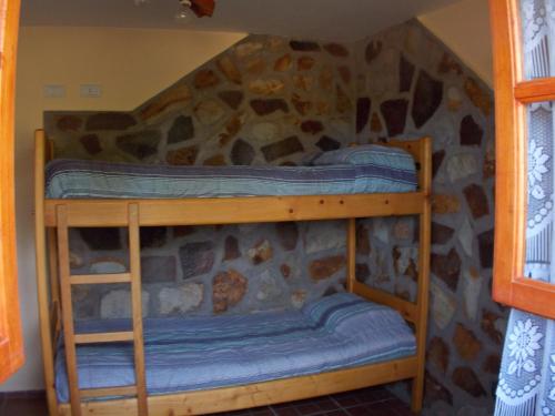 Palanda nebo palandy na pokoji v ubytování Posada Tajaluz