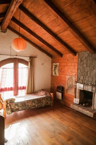 Llit o llits en una habitació de Wayra Waka