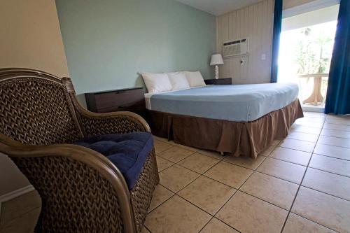 Ένα ή περισσότερα κρεβάτια σε δωμάτιο στο Ocean Villa Inn