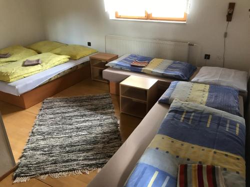 Llit o llits en una habitació de Dovolenkový dom s tromi spálňami