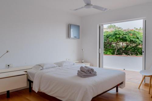 Postel nebo postele na pokoji v ubytování Nice Home Costa Adeje