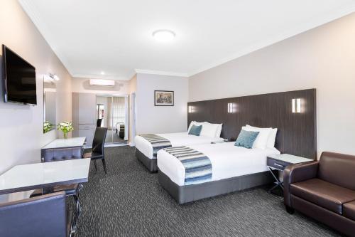 Televisyen dan/atau pusat hiburan di Mercure Goulburn