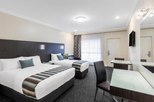 Katil atau katil-katil dalam bilik di Mercure Goulburn
