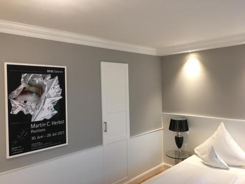 Ένα ή περισσότερα κρεβάτια σε δωμάτιο στο Boutique Hotel am Rathaus - Reblaus