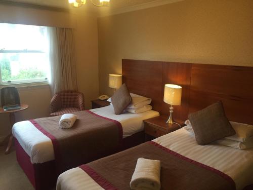 Katil atau katil-katil dalam bilik di The Winnock Hotel