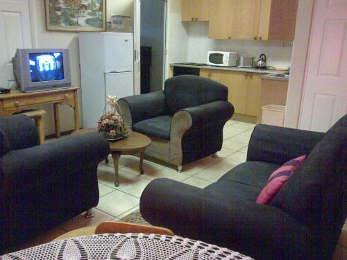 Η κουζίνα ή μικρή κουζίνα στο Port Elizabeth Apartment