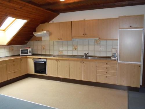 Kuchyň nebo kuchyňský kout v ubytování Ferienhaus Bauer mit wunderschönem Panoramablick