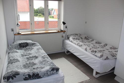 Ένα ή περισσότερα κρεβάτια σε δωμάτιο στο Bække sleepover
