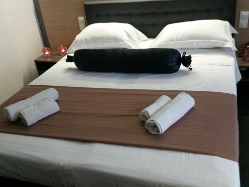 Un ou plusieurs lits dans un hébergement de l'établissement Hotel Prince de Liege
