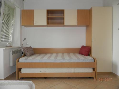 A bed or beds in a room at Apartment Gaber 82