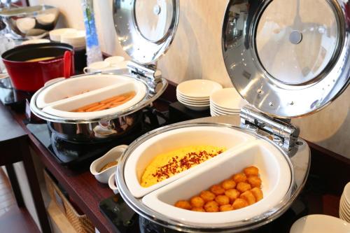 a plate of food sitting on top of a table at Hotel Hokke Club Osaka in Osaka