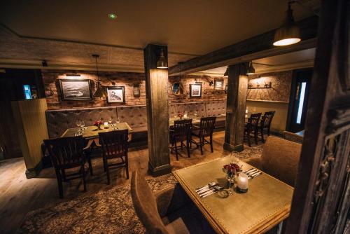 an overhead view of a restaurant with tables and chairs at Bowfield Hotel and Spa in Howwood