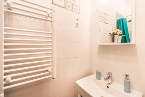 Koupelna v ubytování BpR Szondi Cozy Apartment