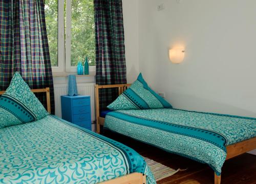 Кровать или кровати в номере Apartmenthaus Kornstrasse
