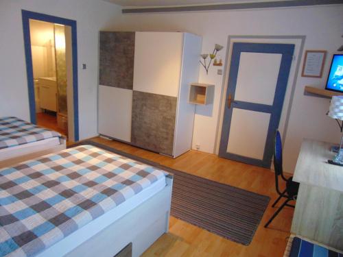Hotel Garni "Adria"にあるベッド