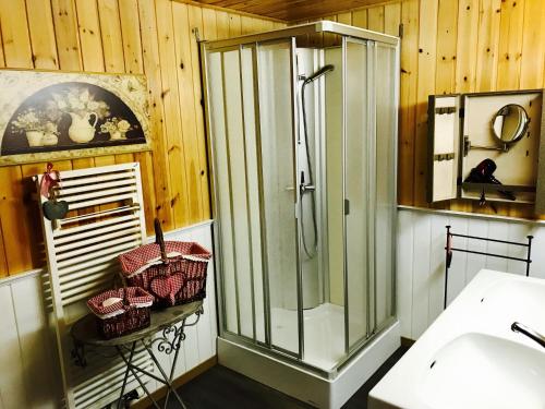 a bathroom with a shower and a sink at Auberge de l'Assesseur - Mont-Soleil in Saint-Imier