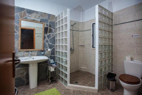 Koupelna v ubytování Villa Gerrito