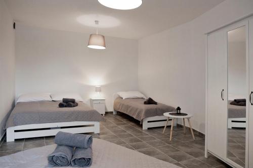 Postel nebo postele na pokoji v ubytování Apartamenty w Starym Browarze 3