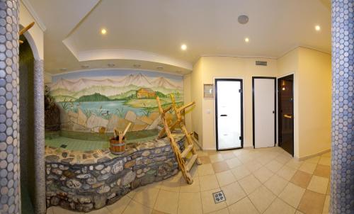 a room with a painting on the wall at Jagdhof in Grossarl