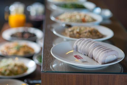 a bunch of plates of food on a table at sunlight mound in Yuanshan