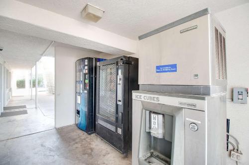 a large machine in a room next to a building at Motel 6-Phoenix, AZ - East in Phoenix