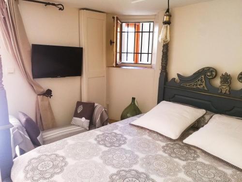 Letto o letti in una camera di La Bombonière & Spa
