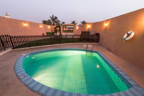 Πισίνα στο ή κοντά στο Boudl Al Nakheel