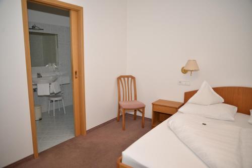 Letto o letti in una camera di Hotel Öhlerhof