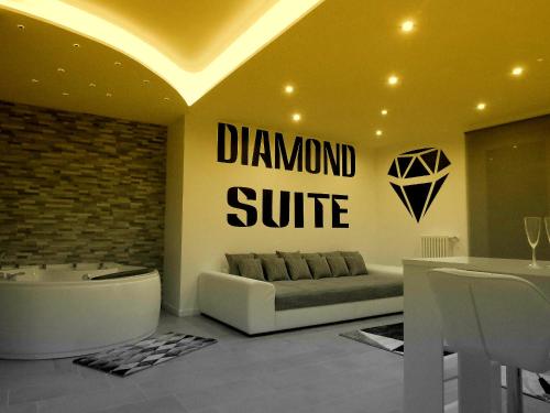 a living room with a couch and a sign that reads diamond suite at Diamond Suite Verona in Verona
