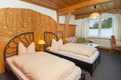 Katil atau katil-katil dalam bilik di Hotel garni Godenhof