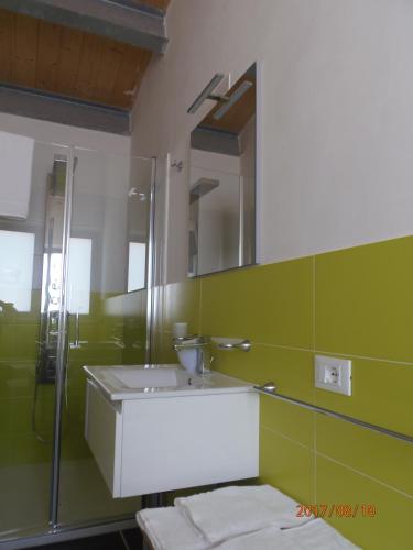 a bathroom with a sink and a shower at B&B Brezza Delle Egadi in Marsala