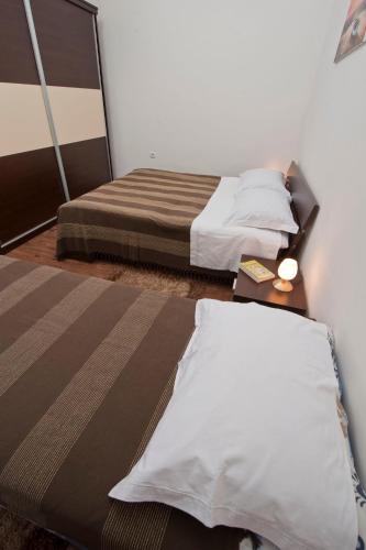 Ένα ή περισσότερα κρεβάτια σε δωμάτιο στο Apartment Vužar