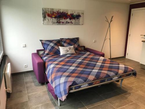 Un pat sau paturi într-o cameră la La Cime des Chodes