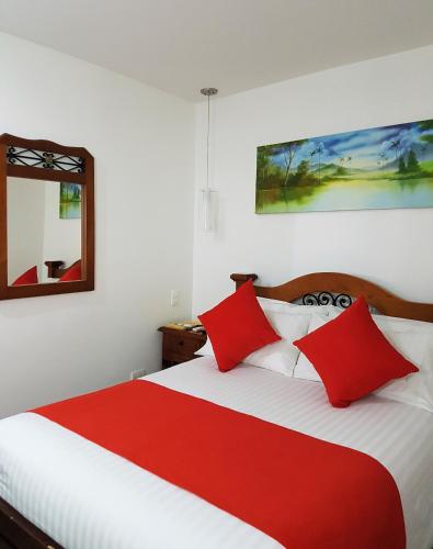 Katil atau katil-katil dalam bilik di Hotel San Jeronimo Armenia