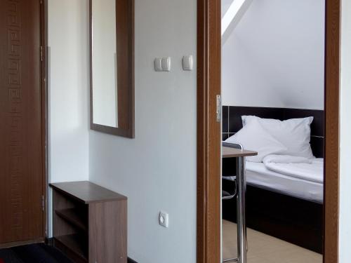 Ένα ή περισσότερα κρεβάτια σε δωμάτιο στο Prince Hotel