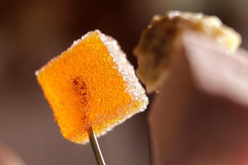 a close up of a piece of food on a toothpick at Hotel Krone Sihlbrugg in Sihlbrugg Dorf