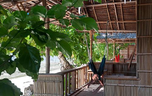 Balkón nebo terasa v ubytování Mambetron Homestay Raja Ampat