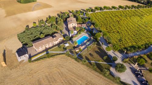 an aerial view of a large estate with a farm at Agriturismo Raggioverde in Recanati